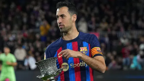 BARCELONA, SPAIN - JANUARY 22: Sergio Busquets of FC Barcelona presents the Spanish Supercopa Trophy to the fans prior to the LaLiga Santander match between FC Barcelona and Getafe CF at Spotify Camp Nou on January 22, 2023 in Barcelona, Spain. (Photo by Alex Caparros/Getty Images)