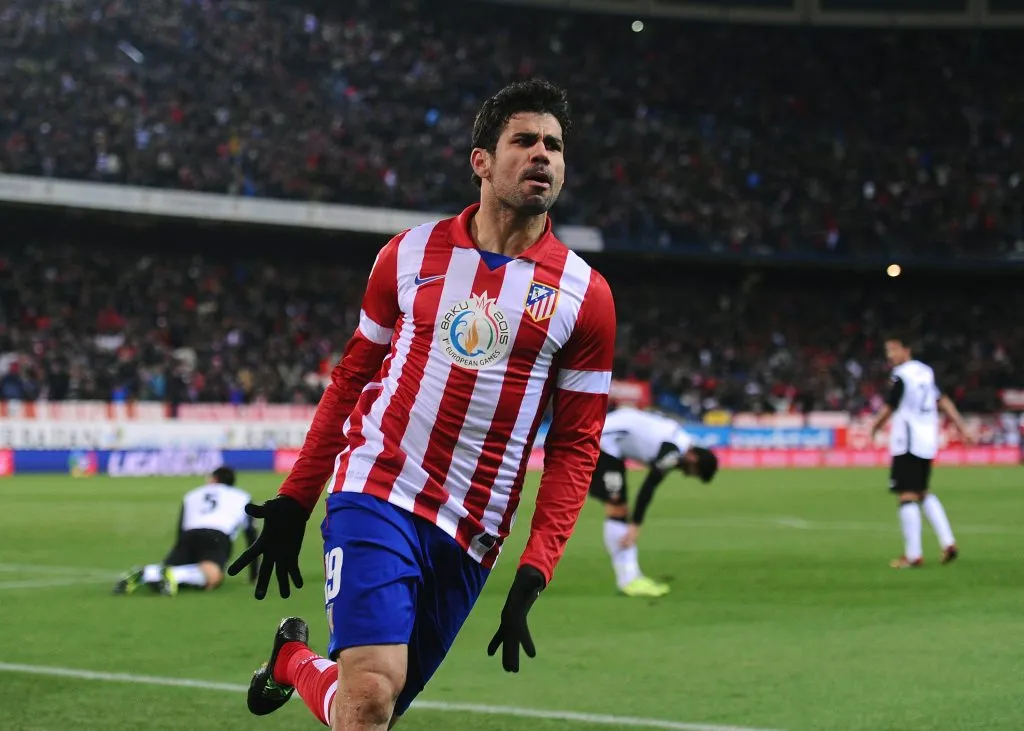 MADRID, SPAIN – DECEMBER 15:   Diego Costa of Club Atletico de Madrid celebrates after scoring Atletico’s opening goal during the La Liga match between Club Atletico de Madrid and Valencia CF at Vicente Calderon Stadium on December 15, 2013 in Madrid, Spain.  (Photo by Denis Doyle/Getty Images)