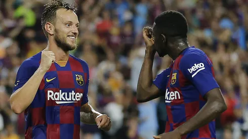 Ivan Rakitic #4 of FC Barcelona celebrates with teammate Ousmane Dembele #11. (Photo by Michael Reaves/Getty Images)