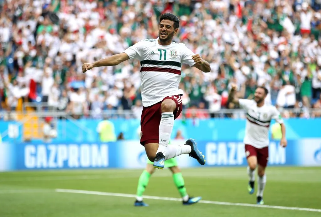 Carlos Vela celebrando gol pelo México. (Photo by Clive Brunskill/Getty Images)