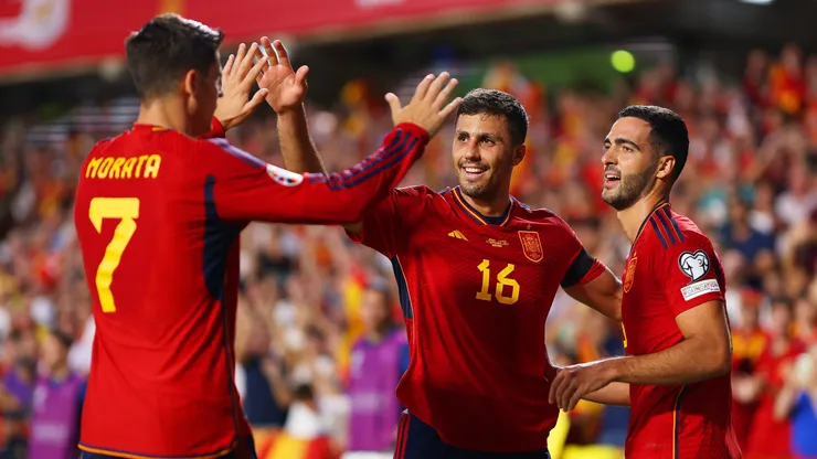 GRANADA, SPAIN - SEPTEMBER 12: Rodri of Spain celebrates with teammates following teammate Mikel Merino's goal during the UEFA EURO 2024 European qualifier match between Spain and Cyprus at Estadio Nuevo Los Carmenes on September 12, 2023 in Granada, Spain. (Photo by Fran Santiago/Getty Images)