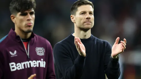 LEVERKUSEN, GERMANY - MARCH 14: Xabi Alonso, Head Coach of Bayer Leverkusen, applauds the fans following the team's victory during the UEFA Europa League 2023/24 round of 16 second leg match between Bayer 04 Leverkusen and Qarabag FK at BayArena on March 14, 2024 in Leverkusen, Germany. (Photo by Alex Grimm/Getty Images)