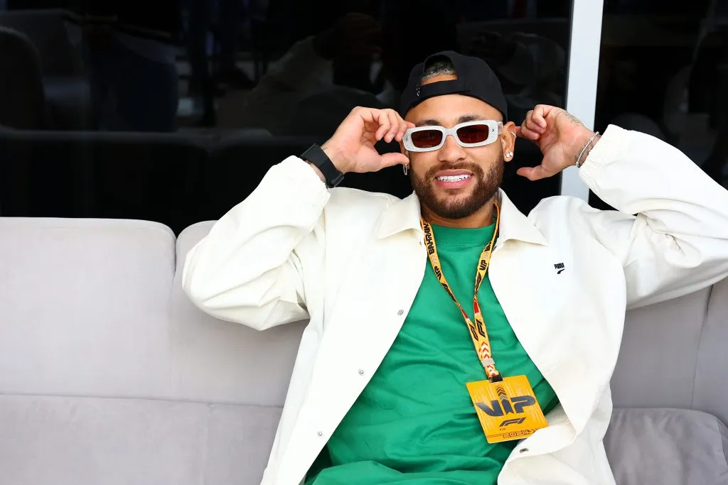 BAHRAIN, BAHRAIN – MARCH 02: Neymar poses for a photo in the Visa Cash App RB garage prior to the F1 Grand Prix of Bahrain at Bahrain International Circuit on March 02, 2024 in Bahrain, Bahrain. (Photo by Mark Thompson/Getty Images)