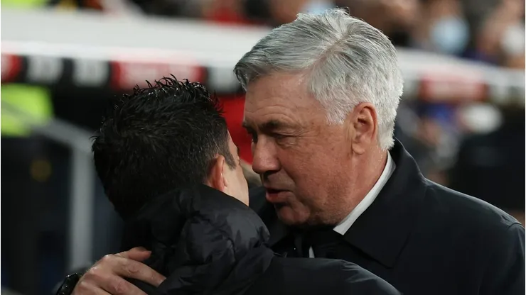 Carlo Ancelotti (R) of Real Madrid and Xavi Hernandez (L) of FC Barcelona (Photo by Gonzalo Arroyo Moreno/Getty Images)