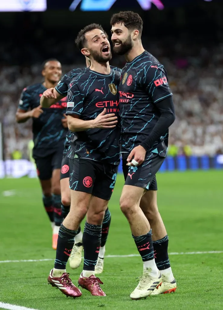 Bernardo Silva e Gvardiol comemoram gol do City. Foto: Clive Brunskill/Getty Images
