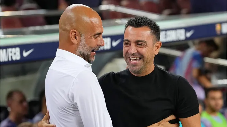 Pep Guardiola, and Xavi, Head coach of FC Barcelona (Photo by Alex Caparros/Getty Images)