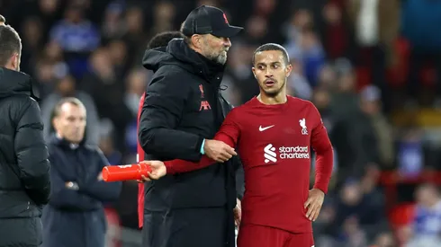 Juergen Klopp, Manager of Liverpool talks with Thiago Alcantara of (Photo by Naomi Baker/Getty Images)