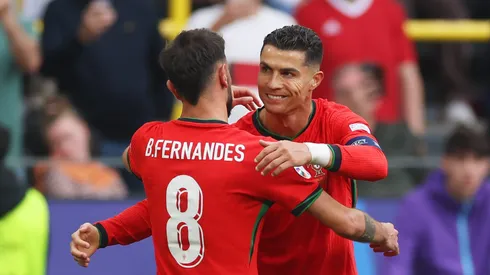 DORTMUND, GERMANY - JUNE 22: Bruno Fernandes of Portugal celebrates scoring his team's third goal with teammate Cristiano Ronaldo during the UEFA EURO 2024 group stage match between Turkiye and Portugal at Football Stadium Dortmund on June 22, 2024 in Dortmund, Germany. (Photo by Lars Baron/Getty Images)