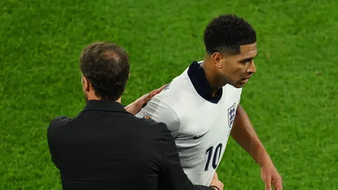 GELSENKIRCHEN, GERMANY - JUNE 16: Jude Bellingham of England embraces Gareth Southgate, Head Coach of England, after being substituted during the UEFA EURO 2024 group stage match between Serbia and England at Arena AufSchalke on June 16, 2024 in Gelsenkirchen, Germany. (Photo by Matthias Hangst/Getty Images)