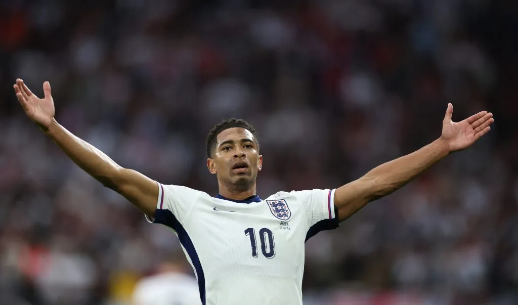 GELSENKIRCHEN, GERMANY – JUNE 16: Jude Bellingham of England celebrates scoring his team’s first goal during the UEFA EURO 2024 group stage match between Serbia and England at Arena AufSchalke on June 16, 2024 in Gelsenkirchen, Germany.   (Photo by Kevin C. Cox/Getty Images)