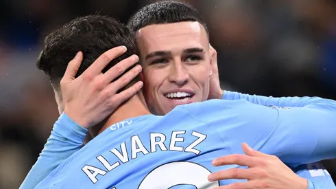 MANCHESTER, ENGLAND – DECEMBER 03: Phil Foden of Manchester City celebrates with teammate Julian Alvarez after scoring the team's second goal during the Premier League match between Manchester City and Tottenham Hotspur at Etihad Stadium on December 03, 2023 in Manchester, England. (Photo by Stu Forster/Getty Images)