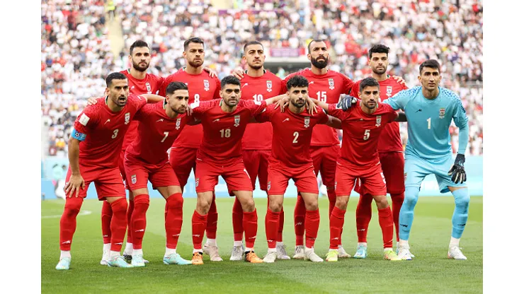 DOHA, QATAR - NOVEMBER 21: Iranian players line up for a team photo prior to the FIFA World Cup Qatar 2022 Group B match between England and IR Iran at Khalifa International Stadium on November 21, 2022 in Doha, Qatar. (Photo by Julian Finney/Getty Images)