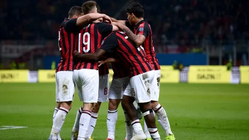 Fabio Borini of AC Milan celebrates with his teammates after