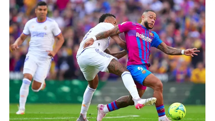 Militão e Depay disputam a bola dentro de campo (Foto: Getty Images)
