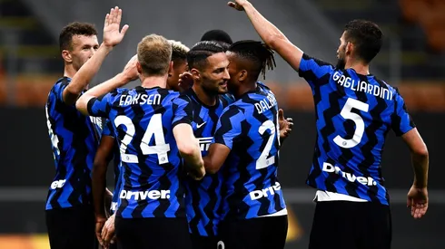 Christian Eriksen (C) of FC Internazionale celebrates with