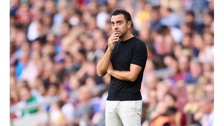 Xavi foi companheiro de Messi no Barcelona.