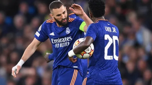 Vinícius Júnior e Benzema comemoram gol pela Champions League (Foto: Getty Images)