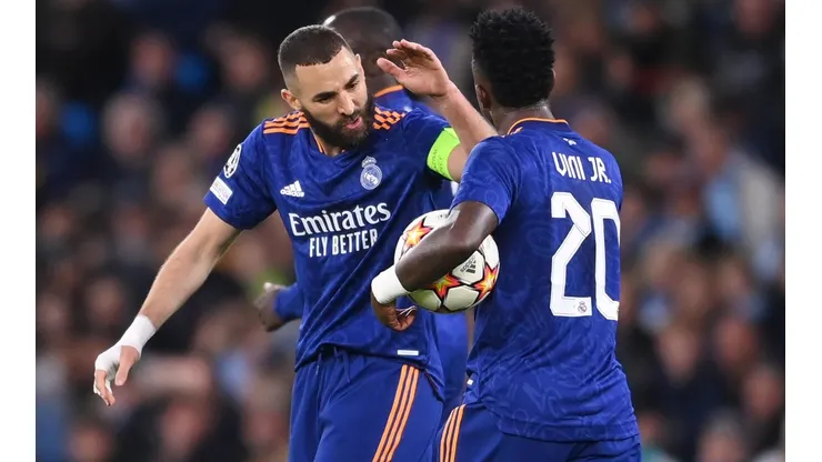 Vinícius Júnior e Benzema comemoram gol pela Champions League (Foto: Getty Images)