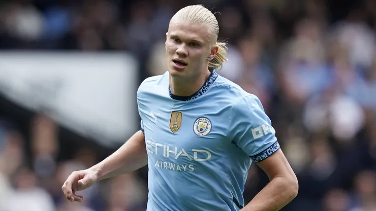 Haaland com a camisa do City.