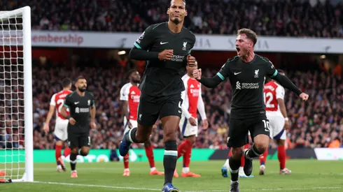 LONDON, ENGLAND - OCTOBER 27: Virgil van Dijk of Liverpool celebrates scoring his team's first goal with Alexis Mac Allister during the Premier League match between Arsenal FC and Liverpool FC at Emirates Stadium on October 27, 2024 in London, England. (Photo by Alex Pantling/Getty Images)