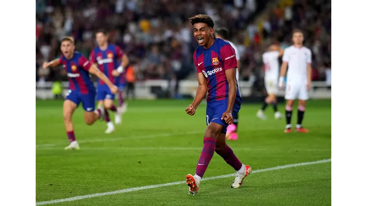 BARCELONA, SPAIN - SEPTEMBER 29: Lamine Yamal of Barcelona celebrates as Sergio Ramos of Sevilla scores an own-goal during the LaLiga EA Sports match between FC Barcelona and Sevilla FC at Estadi Olimpic Lluis Companys on September 29, 2023 in Barcelona, Spain. (Photo by Alex Caparros/Getty Images)