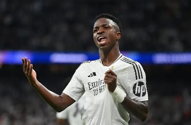 Vini Jr comemora atuação de gala pelo Real Madrid. Foto: Denis Doyle/Getty Images.
