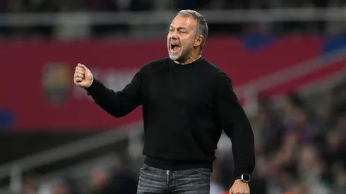 BARCELONA, SPAIN - OCTOBER 20: Hansi Flick, Head Coach of FC Barcelona, reacts during the La Liga EA Sports match between FC Barcelona and Sevilla FC at Estadi Olimpic Lluis Companys on October 20, 2024 in Barcelona, Spain. (Photo by David Ramos/Getty Images)
