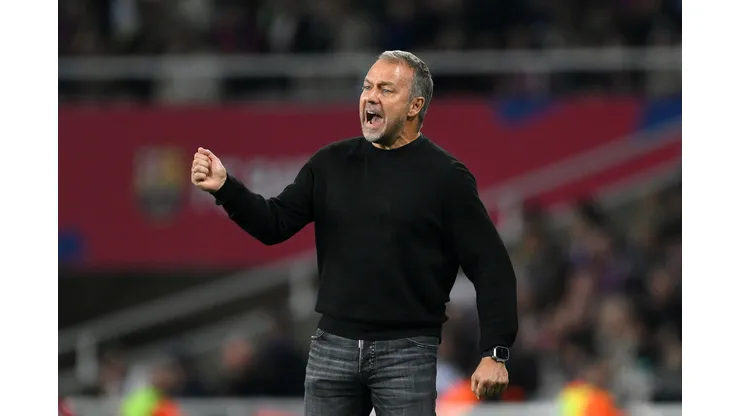 BARCELONA, SPAIN - OCTOBER 20: Hansi Flick, Head Coach of FC Barcelona, reacts during the La Liga EA Sports match between FC Barcelona and Sevilla FC at Estadi Olimpic Lluis Companys on October 20, 2024 in Barcelona, Spain. (Photo by David Ramos/Getty Images)