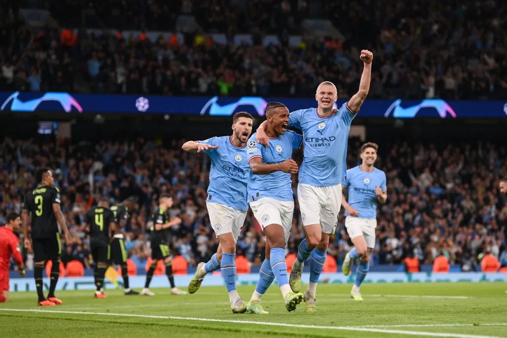 MANCHESTER, ENGLAND – MAY 17: Manuel Akanji celebrates with Erling Haaland of Manchester City after scoring the team’s third goal during the UEFA Champions League semi-final second leg match between Manchester City FC and Real Madrid at Etihad Stadium on May 17, 2023 in Manchester, England. (Photo by Michael Regan/Getty Images)