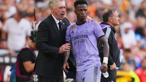 VALENCIA, SPAIN – MAY 21: Carlo Ancelotti, Head Coach of Real Madrid, interacts with Vinicius Junior of Real Madrid during the LaLiga Santander match between Valencia CF and Real Madrid CF at Estadio Mestalla on May 21, 2023 in Valencia, Spain. (Photo by Aitor Alcalde/Getty Images)