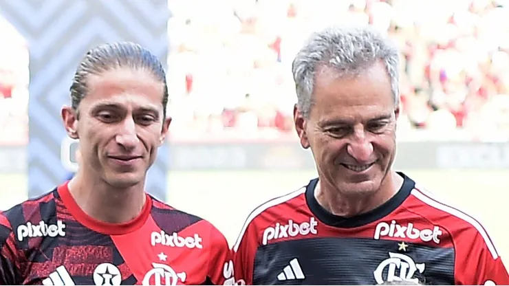 Filipe Luis e Rodolfo Landim lado a lado