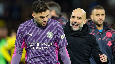 Ederson e Pep Guardiola no Manchester City.