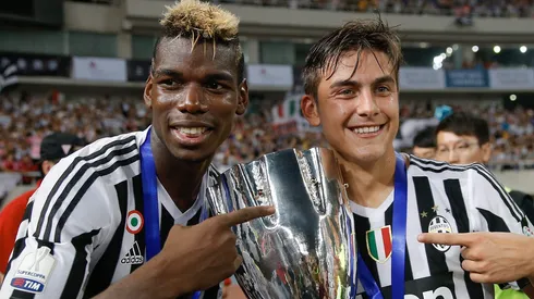 Dybala e Paul Pogba, na Juventus. (Photo by Lintao Zhang/Getty Images)