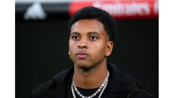 MADRID, SPAIN - OCTOBER 26: Rodrygo of Real Madrid looks on from the sidelines prior to the LaLiga match between Real Madrid CF and FC Barcelona at Estadio Santiago Bernabeu on October 26, 2024 in Madrid, Spain. (Photo by Angel Martinez/Getty Images)