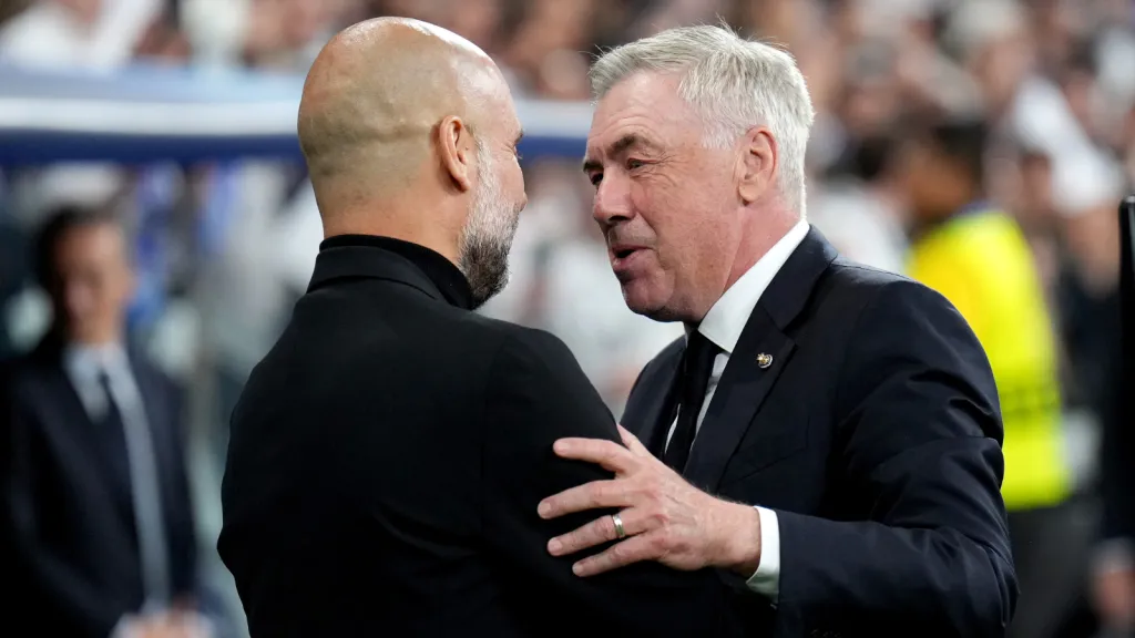 Guardiola e Carlo Ancelotti em partida (Photo by Angel Martinez/Getty Images)