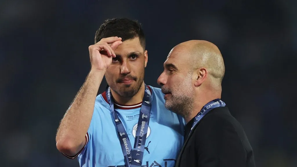 Rodri e Guardiola. (Photo by Michael Steele/Getty Images)