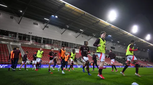 Atletas do United em treino (Photo by Ben Roberts Photo/Getty Images)