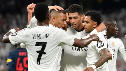 Rodrygo, ao lado de jogadores do Real Madrid (Photo by Denis Doyle/Getty Images)