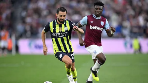 Bernardo Silva e Kudus em jogo entre West Ham e Manchester City. Foto: Justin Setterfield