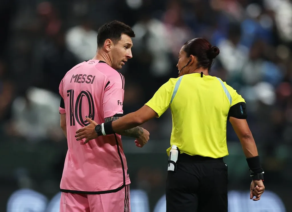 RIYADH, SAUDI ARABIA – JANUARY 29: Lionel Messi of Inter Miami speaks with match referee Edina Alves Batista during the Riyadh Season Cup match between Al Hilal and Inter Miami at Kingdom Arena on January 29, 2024 in Riyadh, Saudi Arabia. (Photo by Yasser Bakhsh/Getty Images)