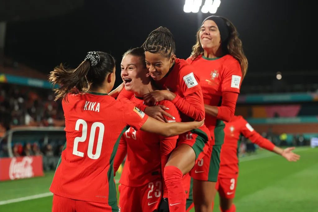 HAMILTON, NEW ZEALAND – JULY 27: Telma Encarnacao (2nd L) of Portugal celebrates with teammates after scoring her team’s first goal during the FIFA Women’s World Cup Australia &amp; New Zealand 2023 Group E match between Portugal and Vietnam at Waikato Stadium on July 27, 2023 in Hamilton, New Zealand. (Photo by Phil Walter/Getty Images)