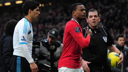 Evra e Luis Suárez em campo (Photo by Shaun Botterill/Getty Images)
