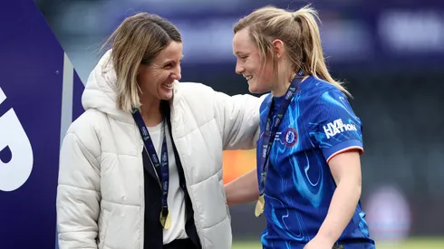 DERBY, ENGLAND - MARCH 15: Sonia Bompastor, Manager of Chelsea, embraces Erin Cuthbert after their teams victory in the Subway Women's League Cup Final match between Chelsea and Manchester City at Pride Park on March 15, 2025 in Derby, England. (Photo by Cameron Smith/Getty Images)