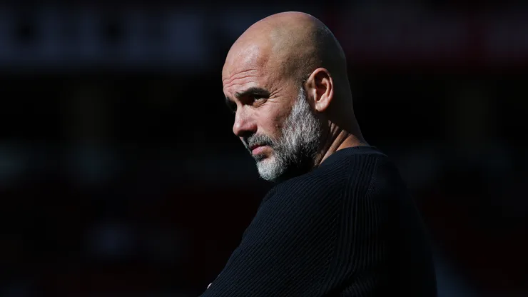 Treinador Pep Guardiola durante partida do Manchester City