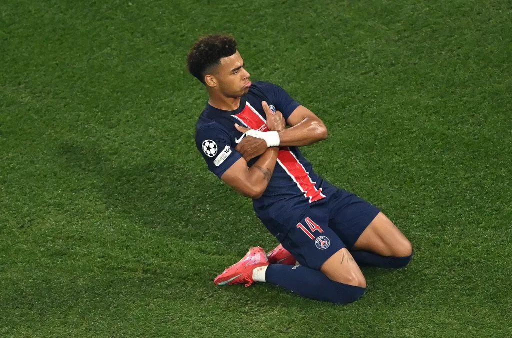 Desire Doué, do Paris Saint-Germain, comemora ao marcar o segundo gol de sua equipe durante a final da UEFA Champions League 2025 entre Paris Saint-Germain e FC Internazionale Milano, na Munich Football Arena, em 31 de maio de 2025, em Munique, Alemanha. (Foto: Dan Mullan/Getty Images)