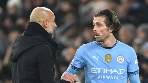 Grealish recebendo orientação de Guardiola. Foto: Michael Regan/Getty Images