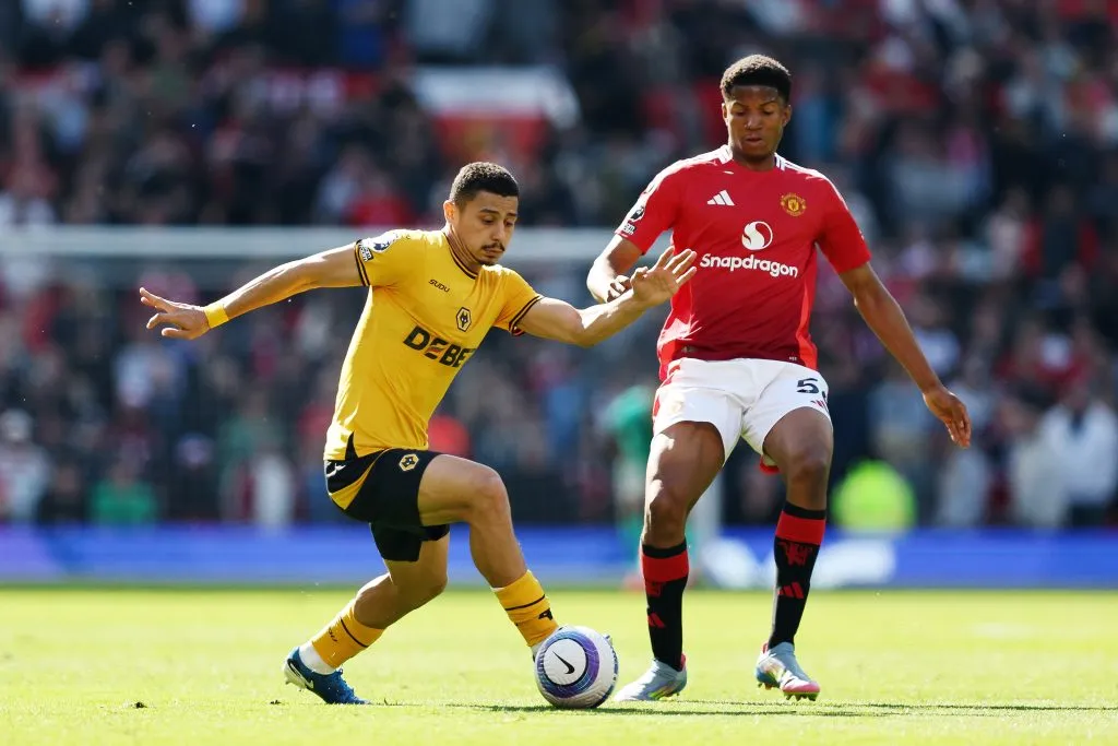 André em ação contra o Manchester United. (Photo by Matt McNulty/Getty Images)