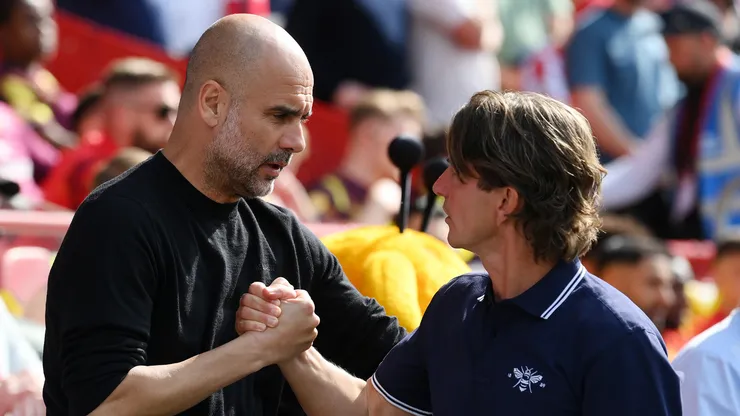Técnicos Guardiola e Thomas Frank lado a lado. (Foto: Mike Hewitt/Getty Images)
