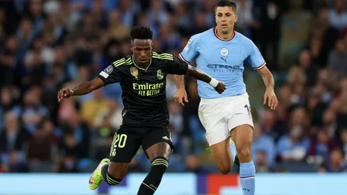 Vinicius Júnior e Rodri em confronto de Champions League
