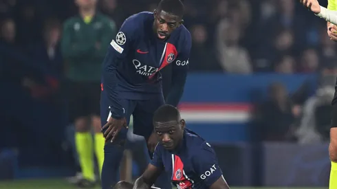 PARIS, FRANCE - OCTOBER 25: Fikayo Tomori of AC Milan reacts after receiving a yellow card from Referee Slavko Vincic for a foul on Randal Kolo Muani of Paris Saint-Germain during the UEFA Champions League match between Paris Saint-Germain and AC Milan at Parc des Princes on October 25, 2023 in Paris, France. (Photo by Mike Hewitt/Getty Images)